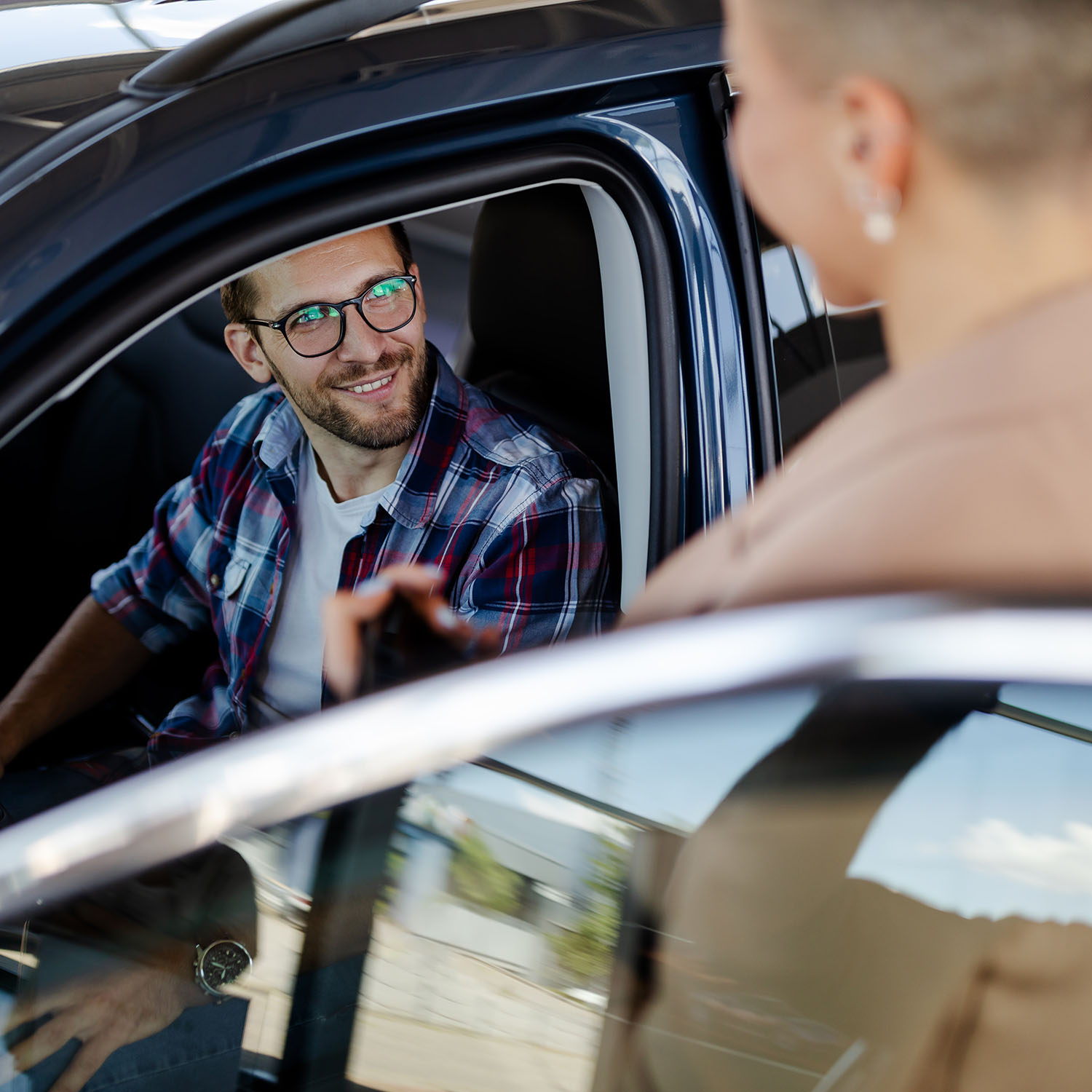 top-view-of-car-buyer-sitting-in-auto-choosing-new-DJKMANH.jpg